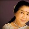 Asha Bhosle portrait smiling in a traditional saree