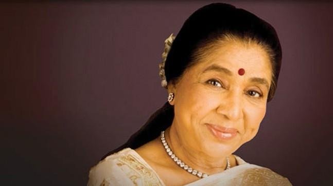 Asha Bhosle portrait smiling in a traditional saree