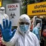 Health worker in protective gear during Ebola alert operations in Bengaluru, Karnataka