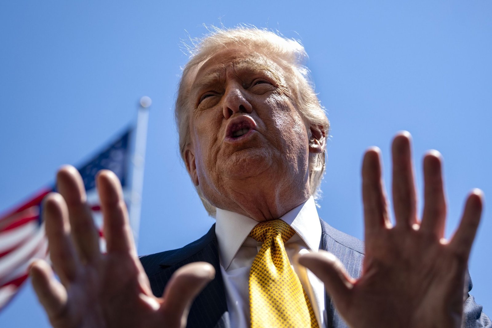 US President Donald Trump speaks during a public address amid escalating tensions over a possible US military strike on Iran.