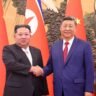 Xi Jinping and Kim Jong Un shake hands during Xi's state visit to North Korea in Pyongyang on June 8, 2026.