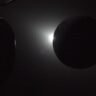Total solar eclipse with the Sun's corona visible around the Moon