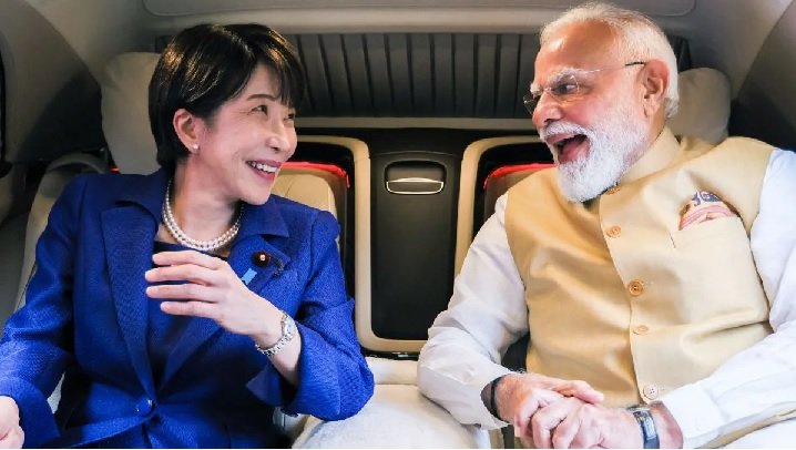 Indian Prime Minister Narendra Modi and Japanese Prime Minister Sanae Takaichi share a smile during the 16th India-Japan Annual Summit in New Delhi, where Modi referred to Takaichi as his "younger sister.