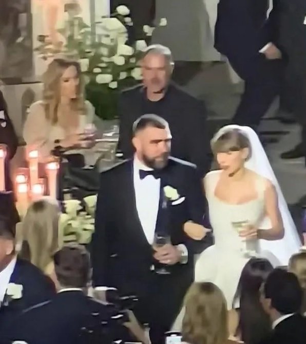 Taylor Swift and Travis Kelce walk together after their wedding ceremony at Madison Square Garden in New York City on July 3, 2026.