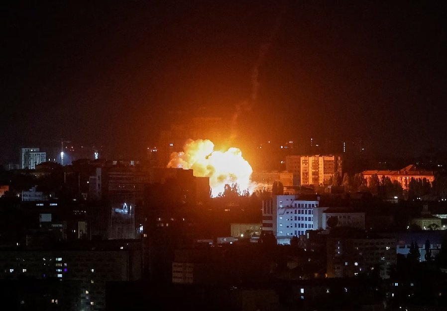Fire and smoke rise over Kyiv after a Russian ballistic missile strike during an overnight attack that killed two people and injured at least 24 on August 5, 2026.