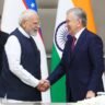 Indian Prime Minister and Uzbekistan President shake hands during bilateral meeting
