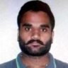 Portrait of an FBI wanted fugitive
