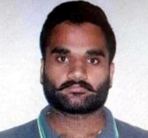 Portrait of an FBI wanted fugitive