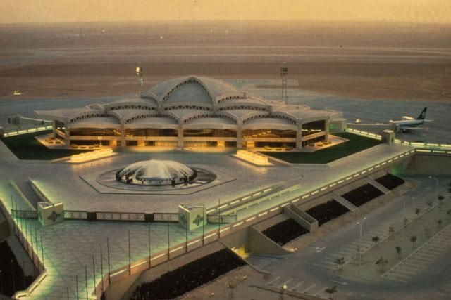 Smoke rises above King Khalid International Airport in Riyadh following reported Houthi attacks