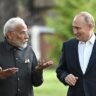 Narendra Modi speaks with Vladimir Putin during India-Russia diplomatic talks